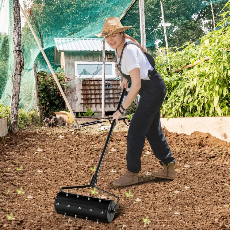 Mały walcowy aerator do trawników z uchwytem i gwoździami